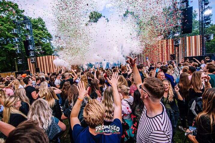 surfers paradise events crowd at outdoor festival with confetti